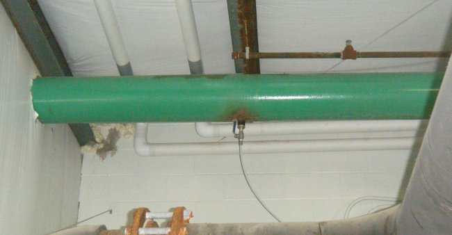Ozone gas is injected into the cooling tower water line